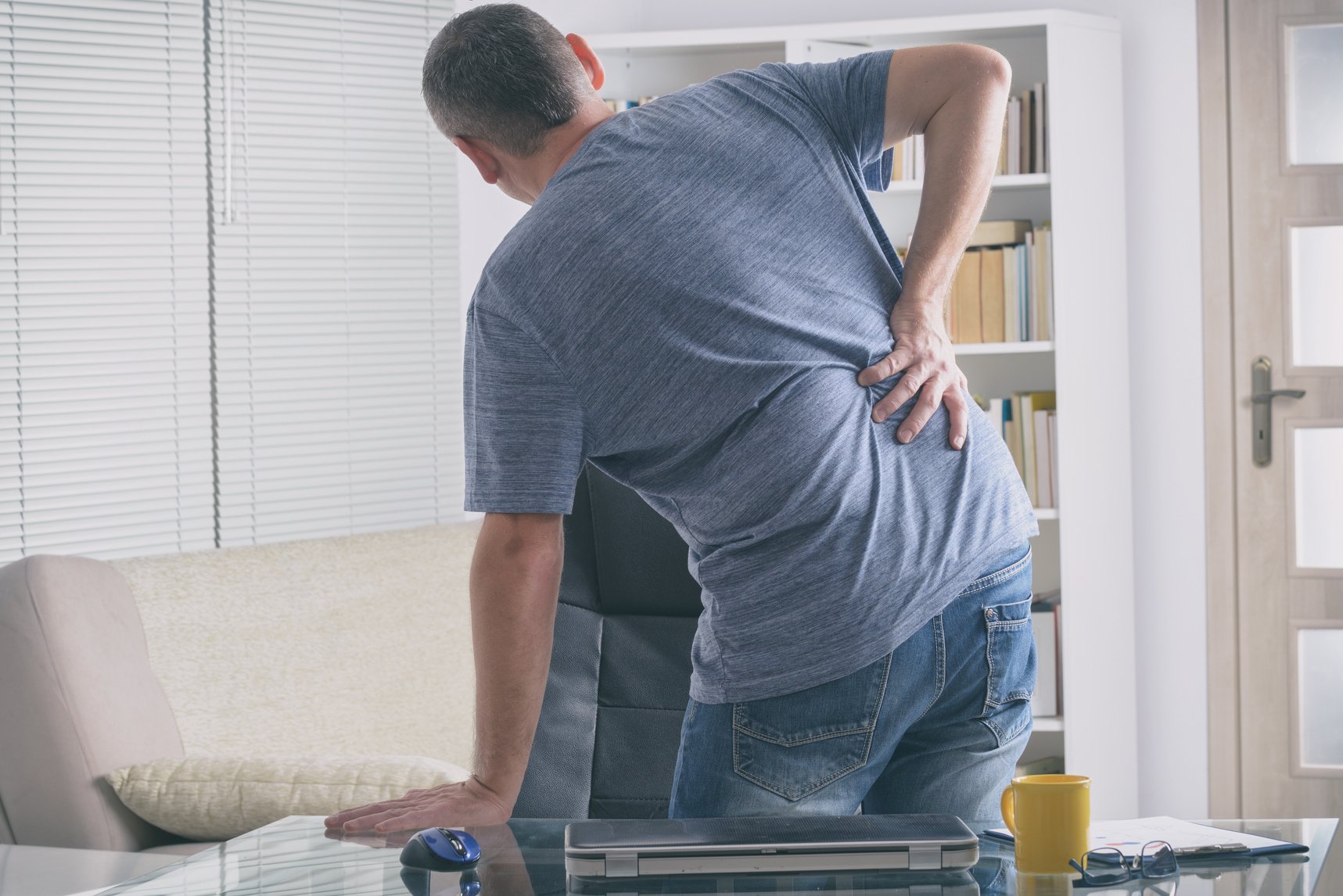 Man suffering from low back pain